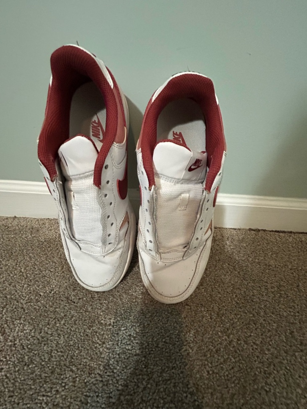Nike White Sneakers with Red Lining and Swoosh